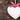 Wooden heart with red gingham ribbon on rustic wood