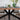 spider leg dining table with grey runner