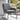 grey armchair with black steel legs