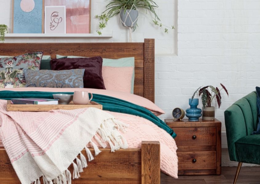 solid wood bed with reclaimed wood bedside table