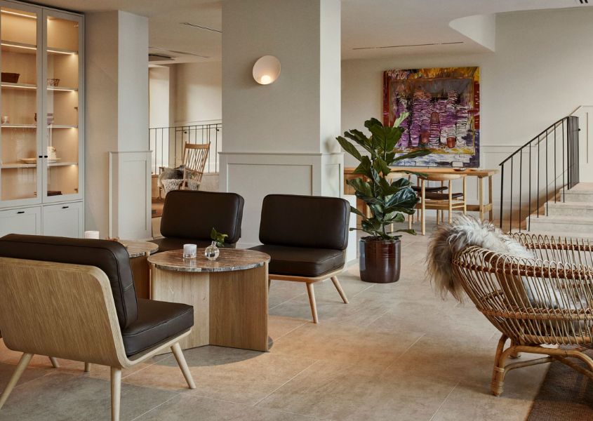 leather armchairs in lobby area of runo hotel featuring