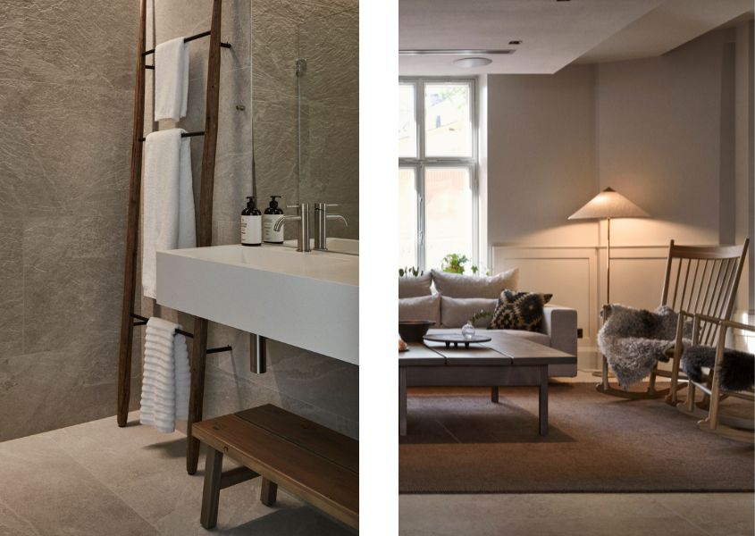 hotel bathroom with reclaimed wood ladder and wooden rocking chair in lounge area