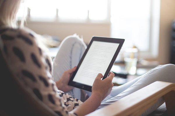 woman reading in reading nook